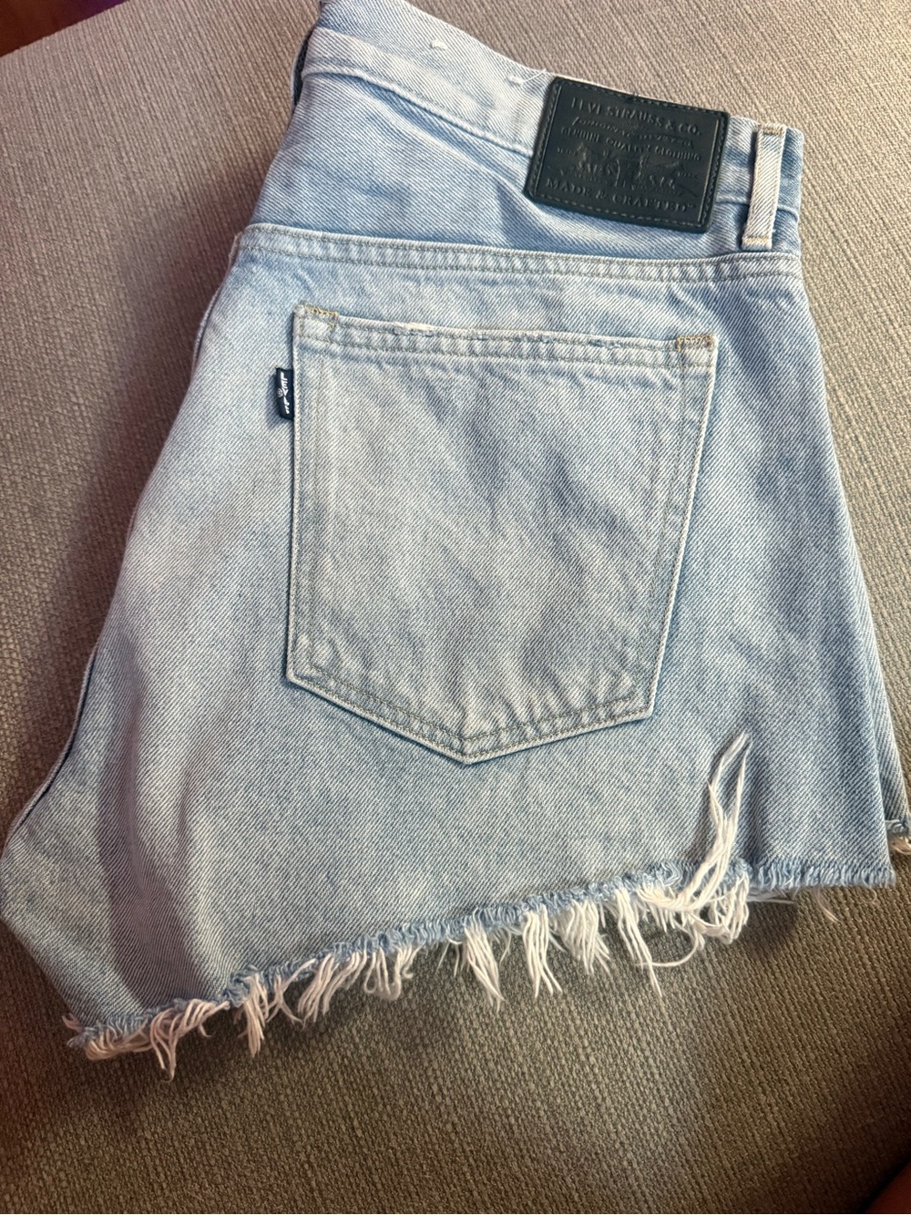 Levi's Faded Light Blue Frayed Denim Shorts